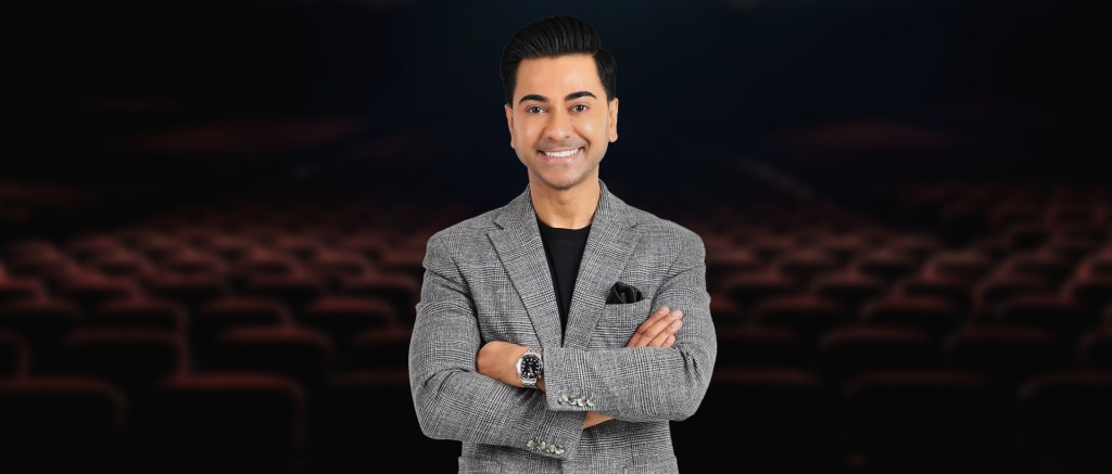 Magician Mo Magic arms folded